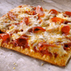 Image for article titled Flatizza Vs. Waffle Taco: A Fast-Food Smackdown For The Ages